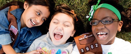 who-we-are-hero Girl Scouts laughing