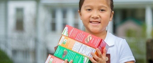 Girl_Scout_with_Cookies_for_Programs